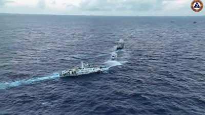 A Chinese Coast Guard ship (CCG 1556) rams a Philippine Coast Guard Unaizah Mae 1 during outine resupply and rotation mission to BRP SIERRA MADRE (LS 57) at Avungin Shoal on December 10 2023 , a day after previously water cannoning Philippines Bureau of F