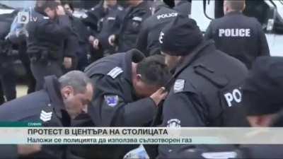Bulgarian police uses pepper spray on protestors in front of the parliament. They forget to take the wind into account.