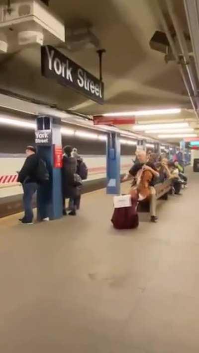 Dueling Strings In The Subway...