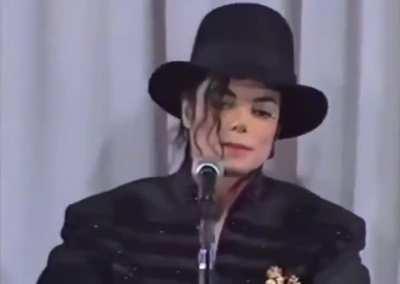 MJ realizing they are taking his photo whenever he moves