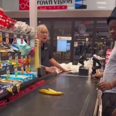 A customer in an American supermarket handed a banana peel to the cashier.