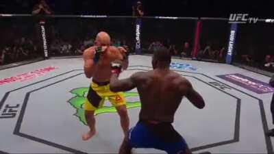 Anthony &quot;Rumble&quot; Johnson hits Glover Teixeira with a right-handed Ford Escort, knocking him into the shadow realm in 10 seconds.