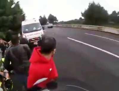 Car hits a group of Bikers who were taking care of an injured teammate