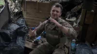 An overjoyed Ukrainian soldier sends a message from the trenches to America