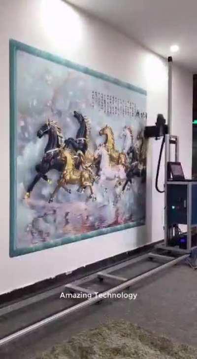 This machine that satisfyingly prints big images on walls.