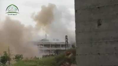 Front-end loader modified into a quad-barreled &quot;Hell Cannon&quot; sees action on the al-Khalidiya front, Aleppo - 5/5/2015