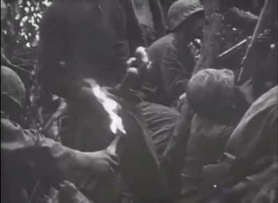 US Marines using Molotov cocktails to root out a stubborn enemy on Peleliu, September 1944.