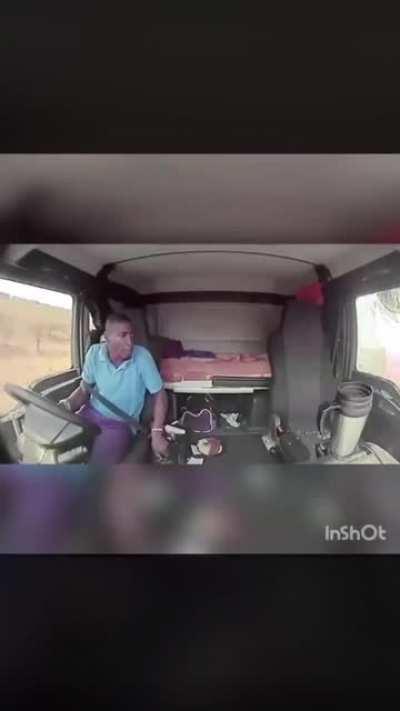 Highway robbers take shots at a moving truck - driver does well to keep it steady!