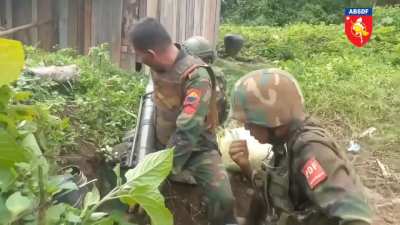 Myanmar rebel forces attacking a Junta boat using Carl Gustav RCL gun.