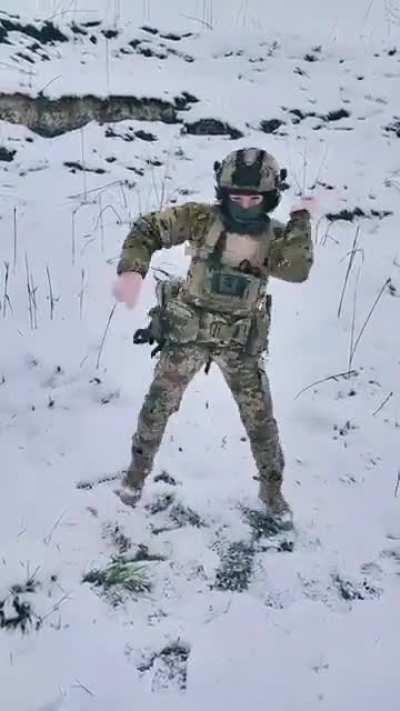 Ukrainian Soldier performs Pikachu dance on battlefield amidst explosions and gunfire. Winter has never been an obstacle to a good mood. By Operative UAarmy