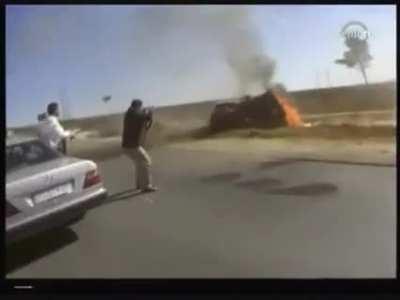 Cameraman keeps his cool during a firefight covering a cop in South Africa