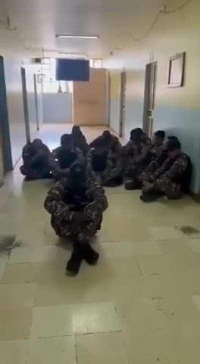 Ecuadorian terror members executing a guard with a pistol