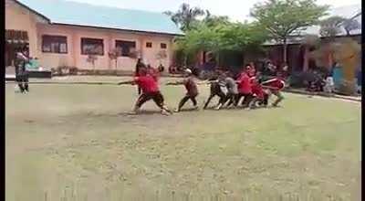 Standing on the rope during Tug of War