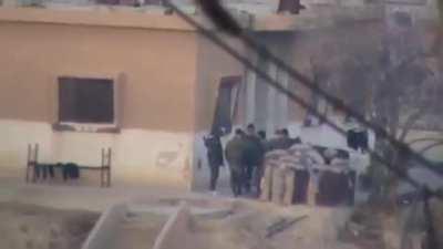 Opposition fighters ambush a gathering of Syrian Army troops with rifle fire - 1/2/2012