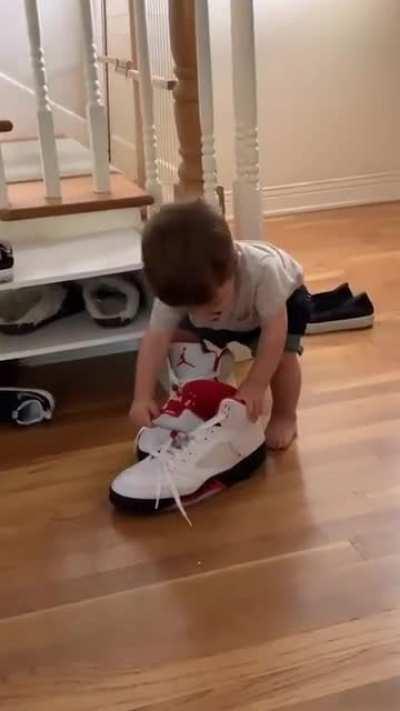 My little dude stealing the Js