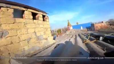 Azov fighter manages to sneak up and destroy a BMP in Mariupol