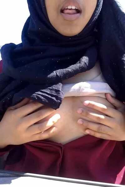 Just a hijabi undressing for fun...