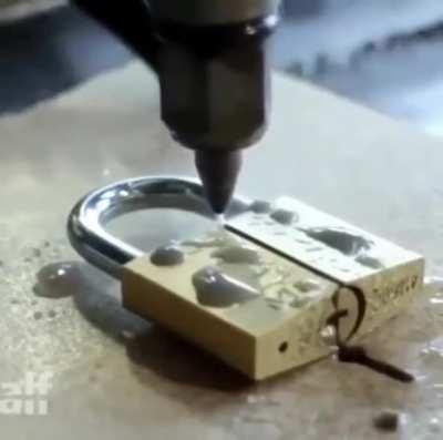 A water jet cutter at 90,000 PSI