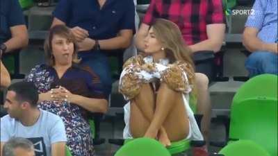 Describing the Belgium-Russia match, the Arab announcer serenaded the woman in the stands.