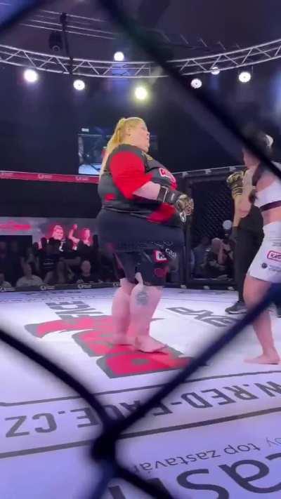 Fat woman KO’s herself by falling down