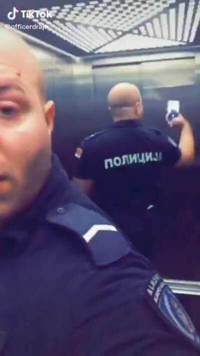 Serbian policeman makes distasteful TikTok during Belgrade riots.