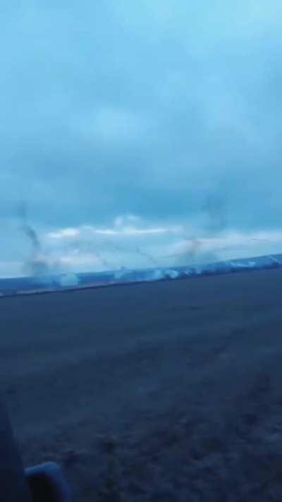 Ukrainian chopper active, Ukrainian AA rolls past recording from the distance