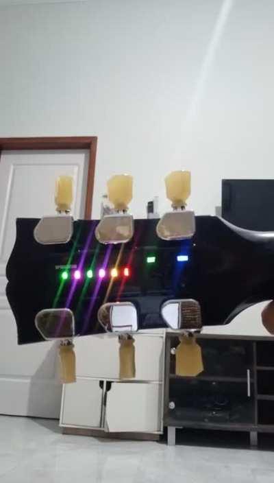 Electric guitar robot tuner 