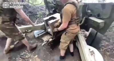 100 mm field gun M1944 (BS-3) firing against Russian positions in the Kharkiv front. Border guards from the Steel Border Brigade. July 8, 2024