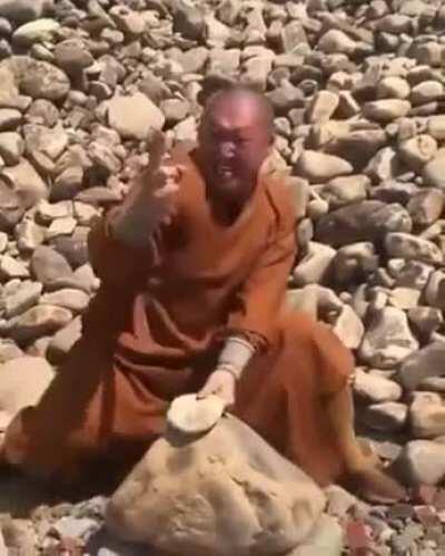 Shaolin with inner Tai Chi breaks stones with 3 then 2 and 1 fingers