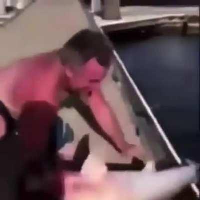 Man almost has arm ripped off by tiny shark