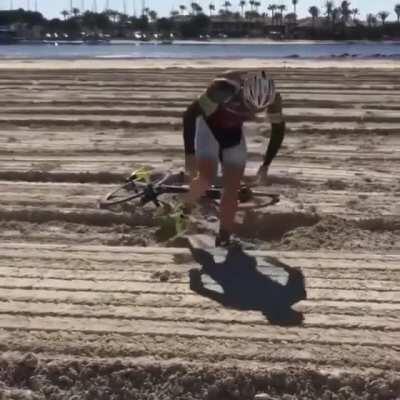 DBS trying to ride your bicycle in deep sand!