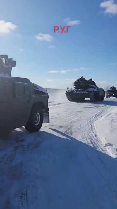 Leopard 1A5 accompanied by the HMMWV R.U.G. from the 59th OMPBr.