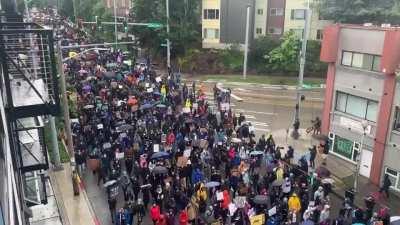 Seattle had a silent march today in the rain. 