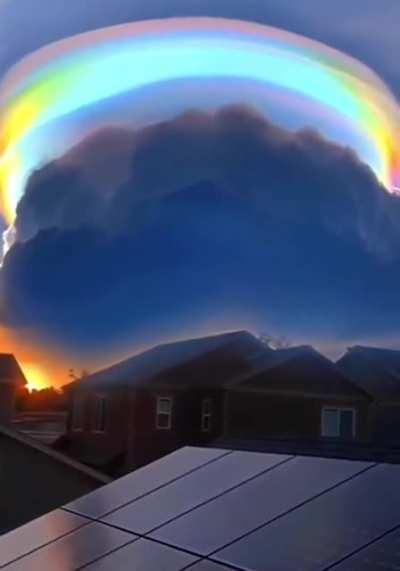 An iridescent pileus cloud