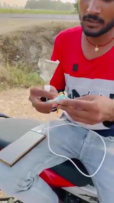 Charging phone using currency