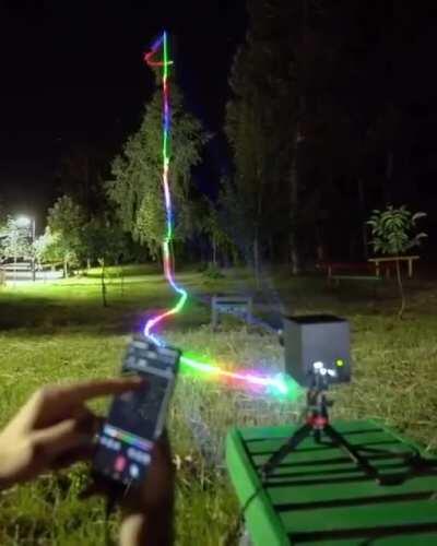 Draw in the air using your phone and a special projector.