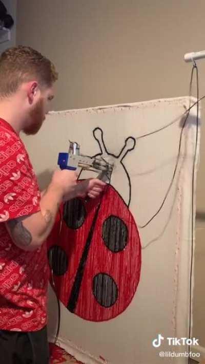 this guy making a carpet