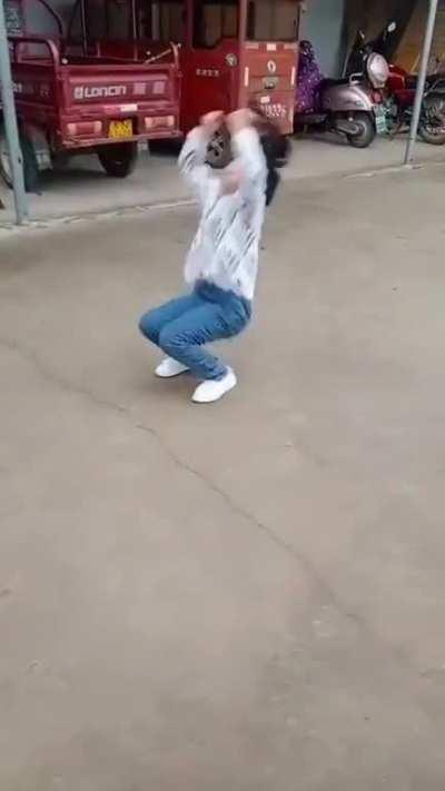 A little girl with some impressive backflips.