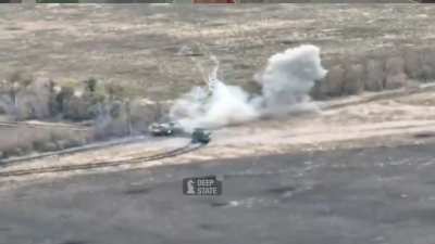 An Ukrainian T-64 tank shoots a charging Russian MT-LB point-blank range.