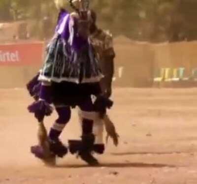 This dance is called &quot;Zaouli&quot; from the central Ivory Coast.