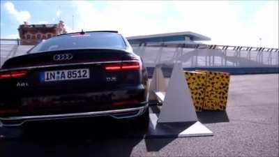 The Audi A8 can react to a potential side collision by raising the suspension by 8 cm