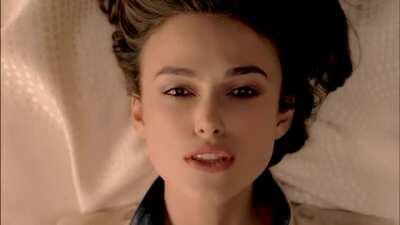 Keira Knightley sensually biting her lips