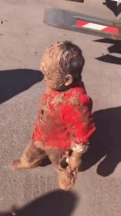 No one can refuse the temptation of mud, especially children