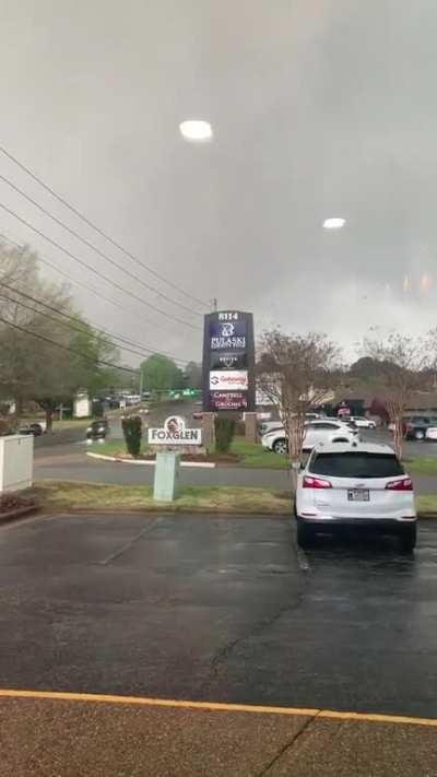 Woman from Little Rock, Arkansas takes direct hit from tornado. Sucked from building into parking lot.