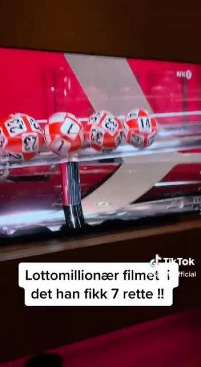 Guy films as he wins the Lotto