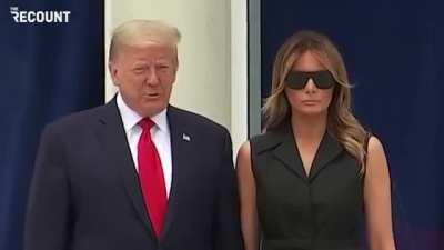 Trump asks Melania to smile during today's photo op.