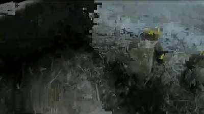 GoPro footage of a Ukrainian soldier attempting to storm a position with his group but then stepping on a mine