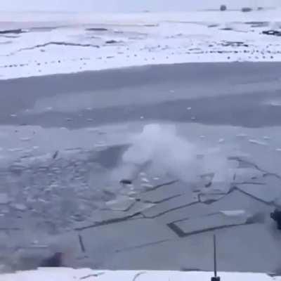 Man crashes car on ice and goes under