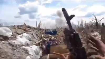 Ukrainian soldiers defend their trench and repel Russian assault