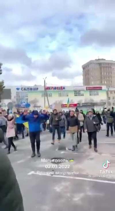 Unarmed people in Melitopol simply give zero fucks and ignore the fact that russian soldiers are shooting over their heads.